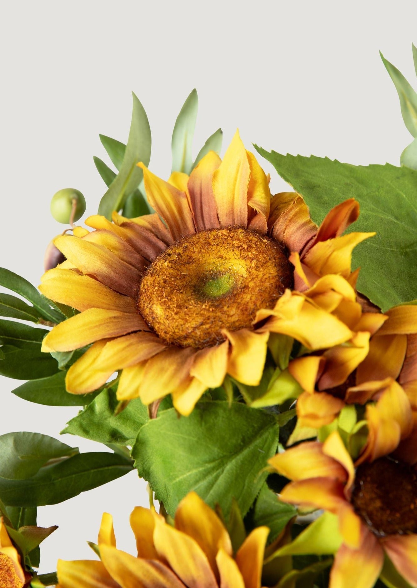 Faux Sunflower and Olive Leaf Arrangement in Glass Vase - 11"